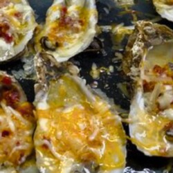 Bakes oysters with jalapeno, bacon, and cheddar
